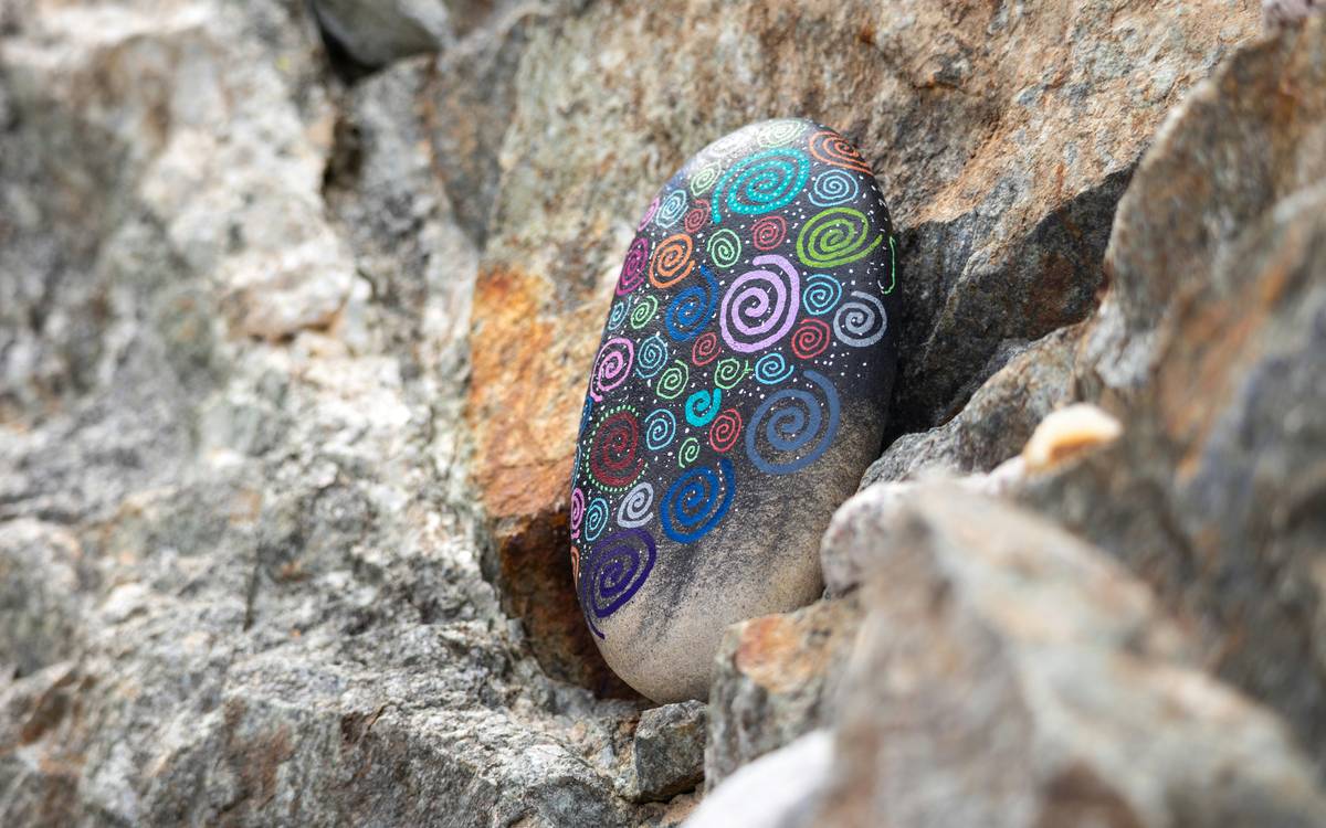 outdoor activity rock painting design easy showing sealed rocks placed in garden gravel