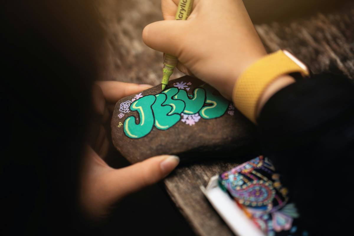 Side-by-side comparison of painted rock for rock painting showing failed vs successful adhesion